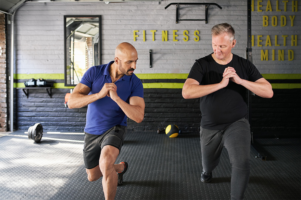 Two people doing stretching exercises